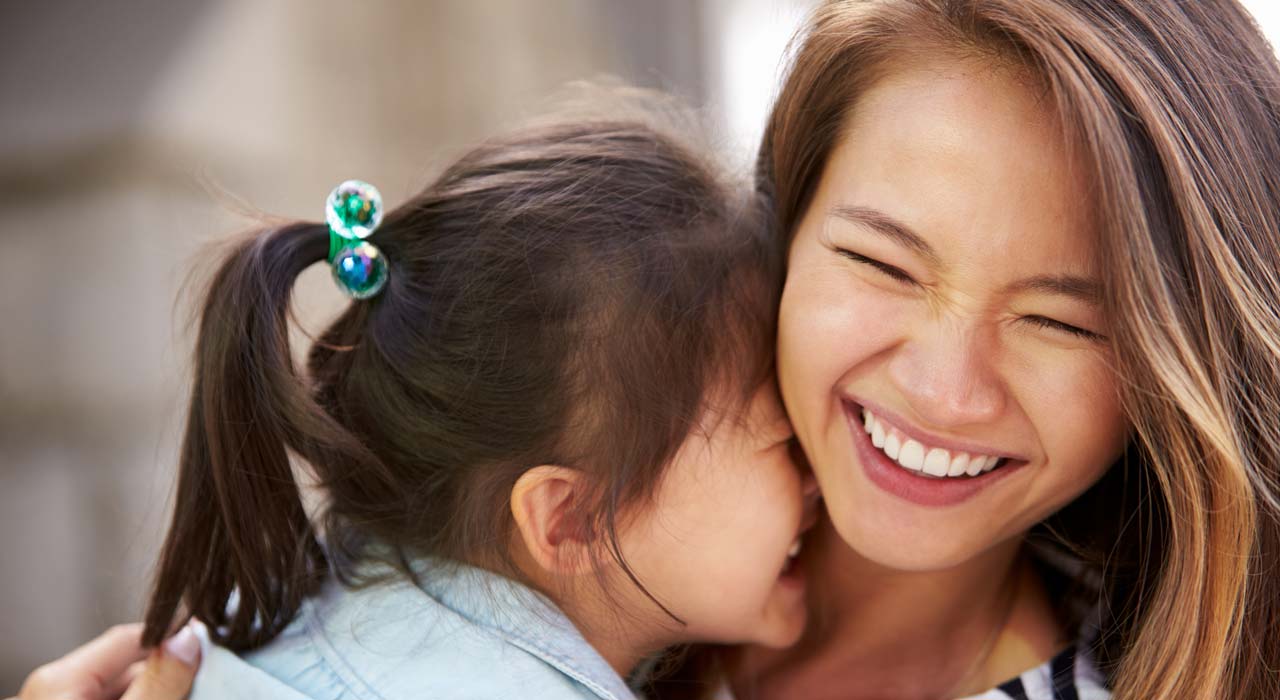 Happy Child & Mother form Pediatric Dentistry in OKC